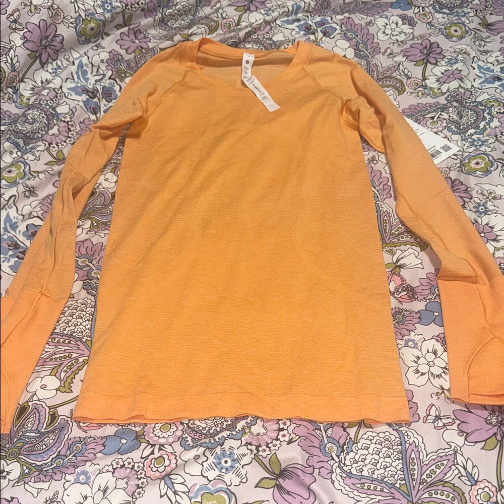 Lululemon swiftly tech long sleeve in hip length
